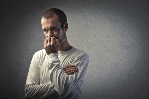 Man Chewing Fingernails