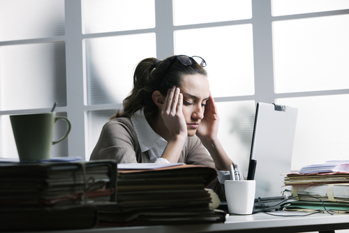 Businesswoman having anxiety attack.