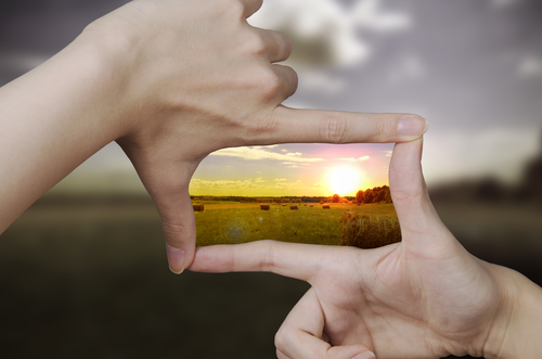 Blurry Landscape Made Sharper Through Boxed Fingers